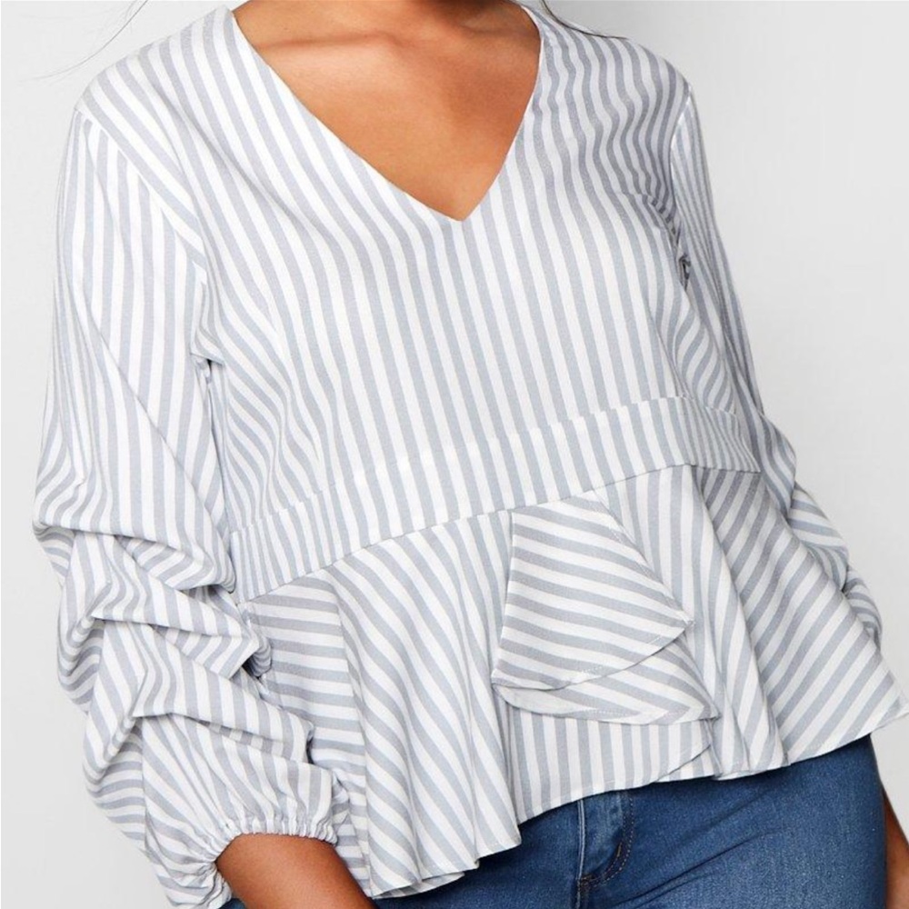 Ruched sleeve peplum top. 16 from Boohoo.